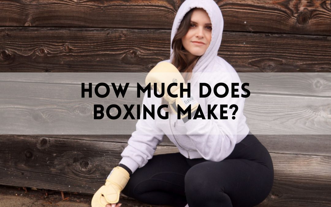 Woman in boxing gloves and hoodie kneeling outdoors, with text overlay that reads “How Much Does Boxing Make?”—highlighting the main keyword.
