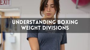 Female boxer in training gear with text overlay that reads “Understanding Boxing Weight Divisions”—highlighting the main keyword boxing weight divisions.